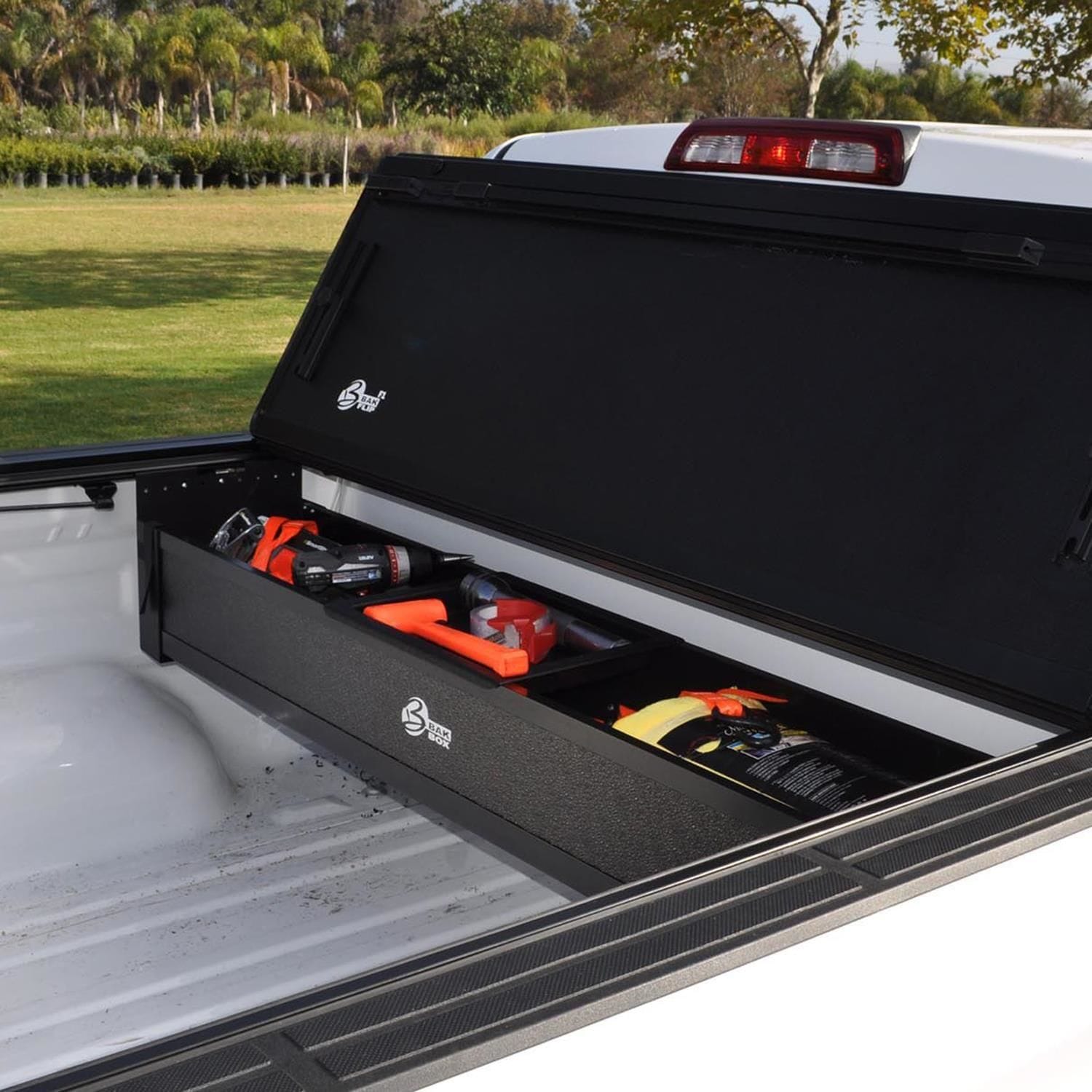 Truck cover store with toolbox